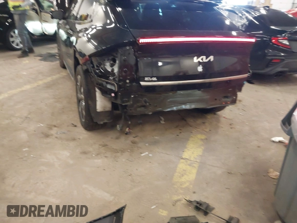 2022 Kia EV6 Wind z VIN KNDC3DLC8N5075492, wystawiony jako IAAI lot #41671331 z przebiegiem 22 122 mil mil oraz . Historia ofert i sprzedaży dostępna na DreamBid. Obrazek 20.