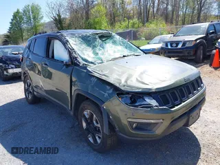 2018 Jeep Compass Trailhawk with VIN 3C4NJDDB0JT241163, listed as a IAAI auction lot 41986193 with 89,246 mi miles and . Bid and sale history available at DreamBid. Image 6.