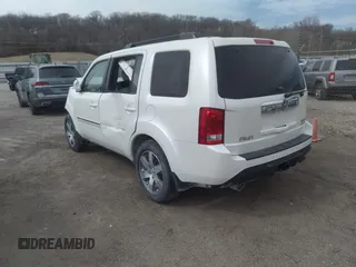2015 Honda Pilot Touring with VIN 5FNYF4H9XFB047607, listed as a IAAI auction lot 41781534 with 157,252 mi miles. Bid and sale history available at carsss.com. Image 3.