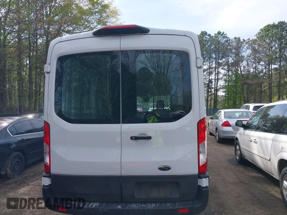 2021 Ford Transit Cargo with VIN 1FTBR1C85MKA48173, listed as a IAAI auction lot 42005472 with 81,980 mi miles and . Bid and sale history available at DreamBid. Image 16.