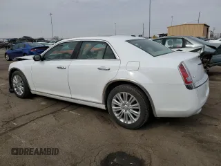 2014 Chrysler 300 C with VIN 2C3CCAKT8EH287743, listed as a Copart auction lot 46525465 with 86,282 mi miles and Salvage Title. Bid and sale history available at DreamBid. Image 2.
