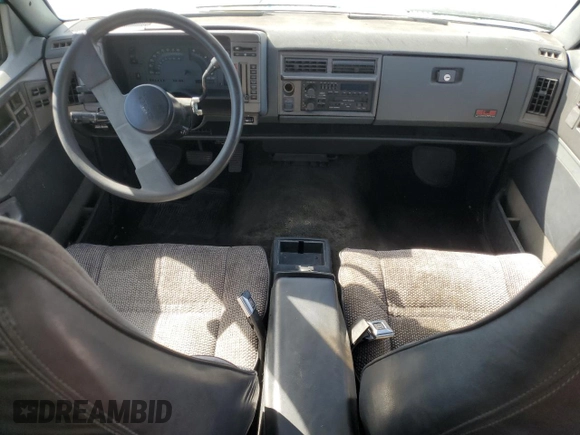 1991 GMC Jimmy z VIN 1GKCS13Z2M2518231, wystawiony jako Copart lot #64115274 z przebiegiem 132 698 mil mil oraz Czysty tytuł • Clean title. Historia ofert i sprzedaży dostępna na DreamBid. Obrazek 8.