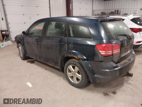 2013 Dodge Journey American Value with VIN 3C4PDCAB3DT594824, listed as a IAAI auction lot 41888188 with 189,053 mi miles and . Bid and sale history available at DreamBid. Image 3.