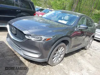 2019 Mazda CX-5 Grand Touring with VIN JM3KFBDM7K0619379, listed as a IAAI auction lot 42007107 with 209,590 mi miles. Bid and sale history available at carsss.com. Image 21.