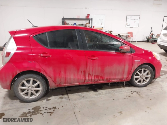2013 Toyota Prius c One with VIN JTDKDTB32D1038030, listed as a IAAI auction lot 41568174 with 1 mi miles. Bid and sale history available at carsss.com. Image 12.