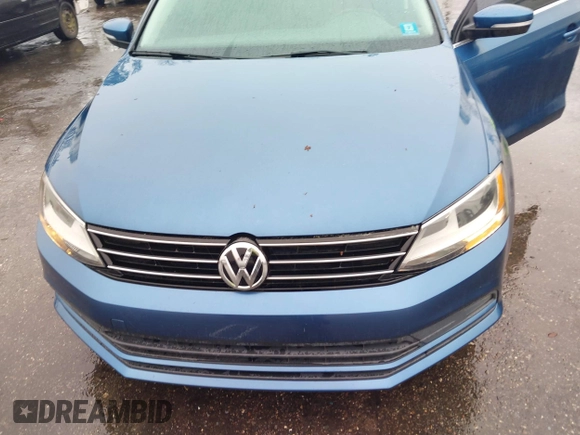 2015 Volkswagen Jetta Sedan 1.8T SE w/Connectivity with VIN 3VWD07AJ9FM329266, listed as a IAAI auction lot 41608542 with 150,476 mi miles. Bid and sale history available at carsss.com. Image 6.