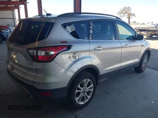 2018 Ford Escape SE with VIN 1FMCU0G90JUC63679, listed as a IAAI auction lot 41658115 with 154,106 mi miles. Bid and sale history available at carsss.com. Image 4.