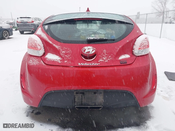 2014 Hyundai Veloster with VIN KMHTC6AD8EU214612, listed as a IAAI auction lot 41258820 with 61,984 mi miles. Bid and sale history available at carsss.com. Image 16.