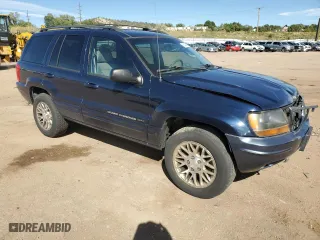 2004 Jeep Grand Cherokee Limited with VIN 1J4GW58S54C166433, listed as a Copart auction lot 71649454 with 174,603 mi miles and Salvage Title. Bid and sale history available at carsss.com. Image 4.