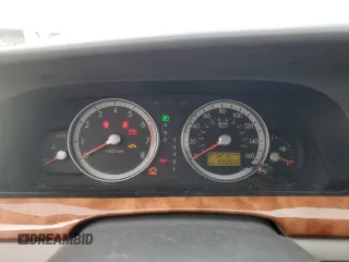 2005 Kia Amanti z VIN KNALD124055055725, wystawiony jako Copart lot #73573754 z przebiegiem 105 665 mil mil oraz Tytuł czysty. Historia ofert i sprzedaży dostępna na DreamBid. Obrazek 9.