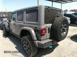 2022 Jeep Wrangler Unlimited Rubicon with VIN 1C4JJXR60NW182756, listed as a IAAI auction lot 36927414 with Not provided miles and . Bid and sale history available at DreamBid. Image 3.