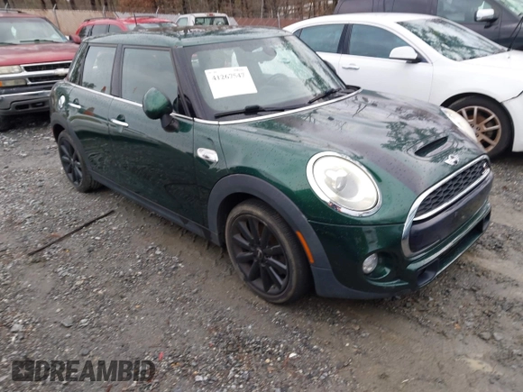 2016 MINI Cooper Hardtop 4 Door S with VIN WMWXU3C58G2D31595, listed as a IAAI auction lot 41267547 with 145,191 mi miles. Bid and sale history available at carsss.com. Image 1.
