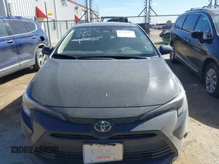 2023 Toyota Corolla Hybrid LE with VIN JTDBCMFE1P3020714, listed as a IAAI auction lot 41726065 with 28,539 mi miles. Bid and sale history available at carsss.com. Image 12.