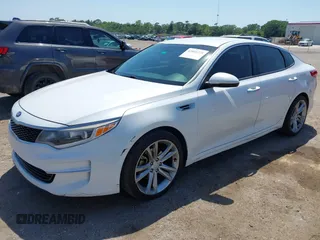 2016 Kia Optima LX with VIN KNAGT4L32G5085128, listed as a IAAI auction lot 42016728 with 259,218 mi miles. Bid and sale history available at carsss.com. Image 2.