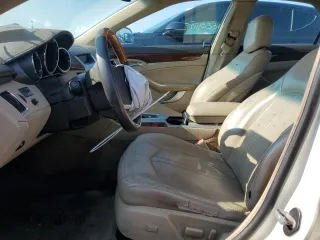 2012 Cadillac CTS Luxury z VIN 1G6DG5E5XC0140112, wystawiony jako Copart lot #63328865 z przebiegiem 104 986 mil mil oraz Szkoda całkowita • Salvage title. Historia ofert i sprzedaży dostępna na DreamBid. Obrazek 7.