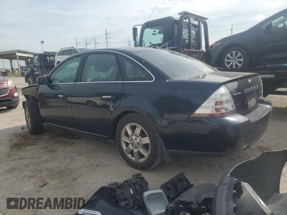 2009 Ford Taurus Limited with VIN 1FAHP25W59G124413, listed as a Copart auction lot 77771044 with 228,831 mi miles and Salvage Title. Bid and sale history available at carsss.com. Image 2.