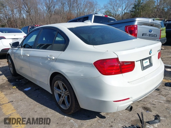 2013 BMW 3 Series 320i with VIN WBA3B1C56DF462549, listed as a IAAI auction lot 41411287 with 119,146 mi miles. Bid and sale history available at carsss.com. Image 3.