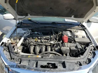 2012 Ford Fusion SEL z VIN 3FAHP0JAXCR220259, wystawiony jako Copart lot #53913975 z przebiegiem 145 424 mil mil oraz Szkoda całkowita • Salvage title. Historia ofert i sprzedaży dostępna na DreamBid. Obrazek 11.