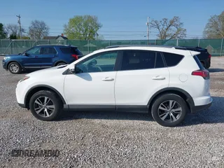 2018 Toyota RAV4 XLE with VIN 2T3WFREV2JW412970, listed as a IAAI auction lot 41986122 with 61,828 mi miles. Bid and sale history available at carsss.com. Image 14.