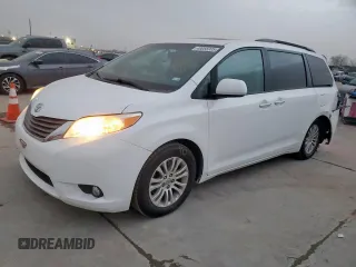 2014 Toyota Sienna XLE with VIN 5TDYK3DC8ES468999, listed as a Copart auction lot 49066005 with 151,296 mi miles and Salvage Title. Bid and sale history available at carsss.com. Image 1.