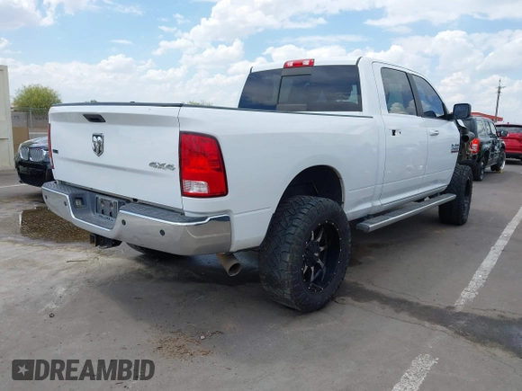 2017 Ram 2500 SLT with VIN 3C6UR5DL8HG551588, listed as a IAAI auction lot 42216223 with 125,891 mi miles and . Bid and sale history available at DreamBid. Image 4.
