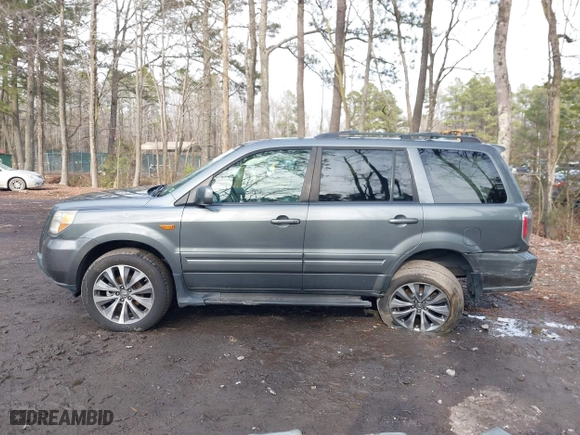 2007 Honda Pilot EX-L with VIN 5FNYF28707B042212, listed as a IAAI auction lot 41478485 with 182,849 mi miles. Bid and sale history available at carsss.com. Image 13.