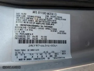 2003 Mercury Grand Marquis GS Convenience with VIN 2MEFM74W63X648064, listed as a Copart auction lot 69247284 with 185,934 mi miles and Salvage Title. Bid and sale history available at carsss.com. Image 12.