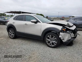 2023 Mazda CX-30 S Preferred with VIN 3MVDMBCM1PM562348, listed as a Copart auction lot 59383805 with 11,858 mi miles and Salvage title. Bid and sale history available at DreamBid. Image 4.