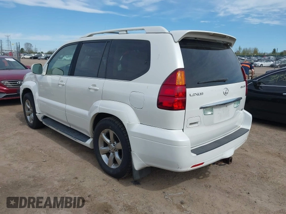 2004 Lexus GX 470 with VIN JTJBT20X440062559, listed as a IAAI auction lot 42142442 with 261,126 mi miles. Bid and sale history available at carsss.com. Image 3.