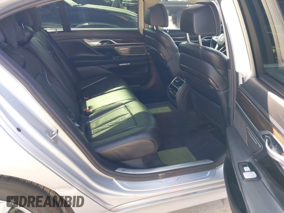 2016 BMW 7 Series 740i with VIN WBA7E2C5XGG739099, listed as a IAAI auction lot 41526038 with 123,900 mi miles. Bid and sale history available at carsss.com. Image 8.