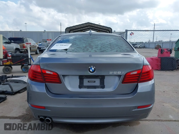 2014 BMW 5 Series 528i with VIN WBA5A5C52ED500696, listed as a IAAI auction lot 41708462 with 121,592 mi miles. Bid and sale history available at carsss.com. Image 16.
