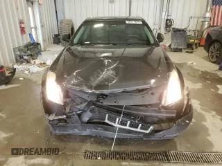2012 Cadillac CTS z VIN 1G6DC8E52C0117999, wystawiony jako Copart lot #58711675 z przebiegiem 92 559 mil mil oraz Nie do naprawy • Non repairable. Historia ofert i sprzedaży dostępna na DreamBid. Obrazek 5.