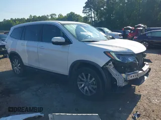 2020 Honda Pilot EX-L z VIN 5FNYF5H57LB008441, wystawiony jako IAAI lot #42144696 z przebiegiem 93 828 mil mil oraz . Historia ofert i sprzedaży dostępna na DreamBid. Obrazek 1.