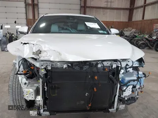 2024 Lexus RX 350h with VIN 2T2BBMCA6RC039544, listed as a IAAI auction lot 42224785 with 9,952 mi miles and . Bid and sale history available at DreamBid. Image 13.