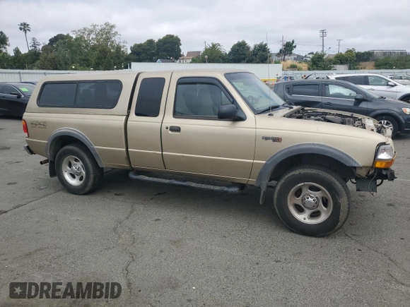 1999 Ford Ranger XLT with VIN 1FTZR15X6XPB58756, listed as a Copart auction lot 58839535 with 127,860 mi miles and Salvage title. Bid and sale history available at DreamBid. Image 4.