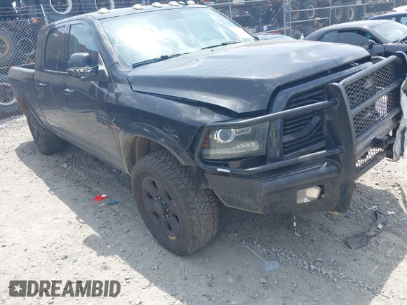 2018 Ram 2500 Laramie with VIN 3C6UR5NLXJG256688, listed as a IAAI auction lot 42168537 with 214,596 mi miles and . Bid and sale history available at DreamBid. Image 1.