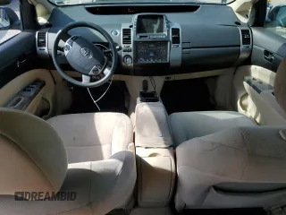 2004 Toyota Prius z VIN JTDKB20U640071890, wystawiony jako Copart lot #58633435 z przebiegiem Nie podano mil oraz Czysty tytuł • Clean title. Historia ofert i sprzedaży dostępna na DreamBid. Obrazek 8.