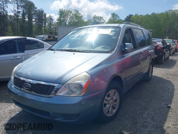 2011 Kia Sedona LX with VIN KNDMG4C7XB6394183, listed as a IAAI auction lot 41988292 with 246,557 mi miles. Bid and sale history available at carsss.com. Image 2.