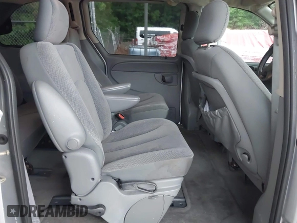 2005 Dodge Caravan SXT with VIN 1D4GP45RX5B289704, listed as a IAAI auction lot 42758561 with 110,396 mi miles and . Bid and sale history available at DreamBid. Image 8.