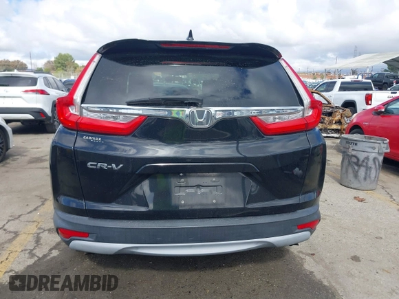 2017 Honda CR-V EX with VIN 7FARW1H55HE009693, listed as a IAAI auction lot 41539260 with 136,645 mi miles. Bid and sale history available at carsss.com. Image 16.
