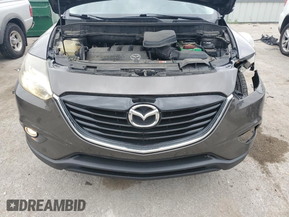 2015 Mazda CX-9 Grand Touring z VIN JM3TB2DA0F0468350, wystawiony jako Copart lot #61545095 z przebiegiem 154 050 mil mil oraz Szkoda całkowita • Salvage title. Historia ofert i sprzedaży dostępna na DreamBid. Obrazek 12.