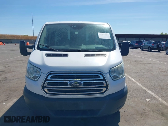 2016 Ford Transit Cargo with VIN 1FTYR1ZM3GKA69459, listed as a IAAI auction lot 42267325 with 183,940 mi miles and . Bid and sale history available at DreamBid. Image 12.