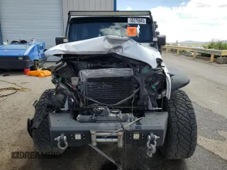 2012 Jeep Wrangler Unlimited Altitude with VIN 1C4HJWEG8CL163653, listed as a Copart auction lot 55279045 with 107,076 mi miles and Salvage title. Bid and sale history available at DreamBid. Image 5.