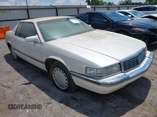 1994 Cadillac Eldorado ESC z VIN 1G6EL12Y4RU604343, wystawiony jako IAAI lot #42221885 z przebiegiem Nie podano mil oraz . Historia ofert i sprzedaży dostępna na DreamBid. Obrazek 1.