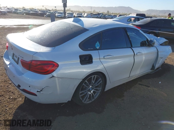 2018 BMW 4 Series 430i with VIN WBA4J1C5XJBG77414, listed as a IAAI auction lot 41685952 with Not Provided miles and . Bid and sale history available at DreamBid. Image 4.