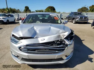 2017 Ford Fusion Energi SE with VIN 3FA6P0PU7HR191271, listed as a Copart auction lot 36938703 with 44,224 mi miles. Bid and sale history available at carsss.com. Image 5.