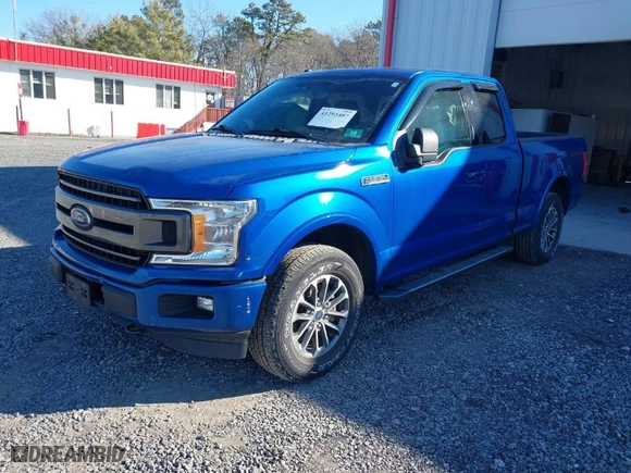 2018 Ford F-150 XL with VIN 1FTEX1EP5JKC90237, listed as a IAAI auction lot 41293407 with 140,873 mi miles. Bid and sale history available at carsss.com. Image 2.