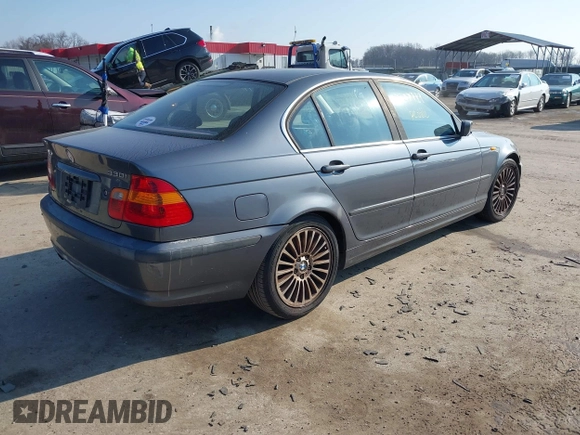 2002 BMW 3 Series 330i with VIN WBAEV53432KM16812, listed as a IAAI auction lot 41500999 with 162,817 mi miles and . Bid and sale history available at DreamBid. Image 4.