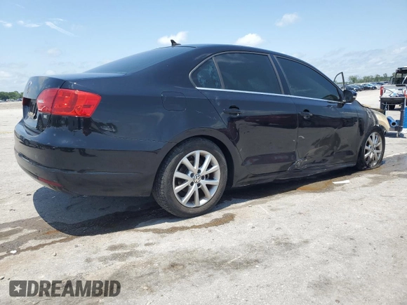 2014 Volkswagen Jetta SE z VIN 3VWD07AJ4EM445862, wystawiony jako Copart lot #61411995 z przebiegiem Nie podano mil oraz Czysty tytuł • Clean title. Historia ofert i sprzedaży dostępna na DreamBid. Obrazek 3.