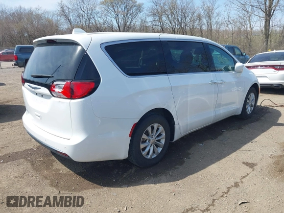 2018 Chrysler Pacifica Touring Plus with VIN 2C4RC1FG8JR125229, listed as a IAAI auction lot 41907817 with 107,914 mi miles and . Bid and sale history available at DreamBid. Image 4.